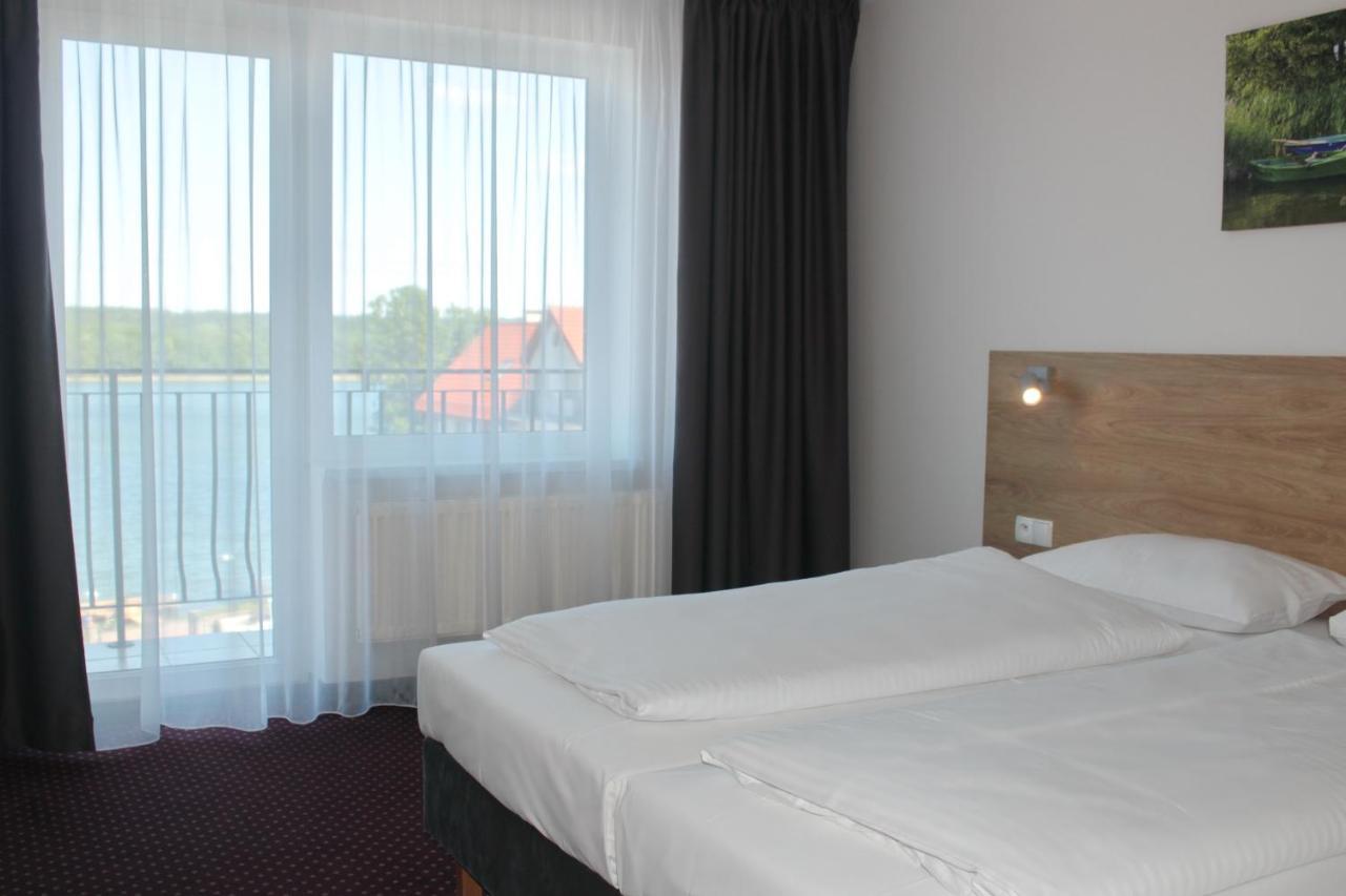 Hotel Huszcza Мронгово Экстерьер фото
