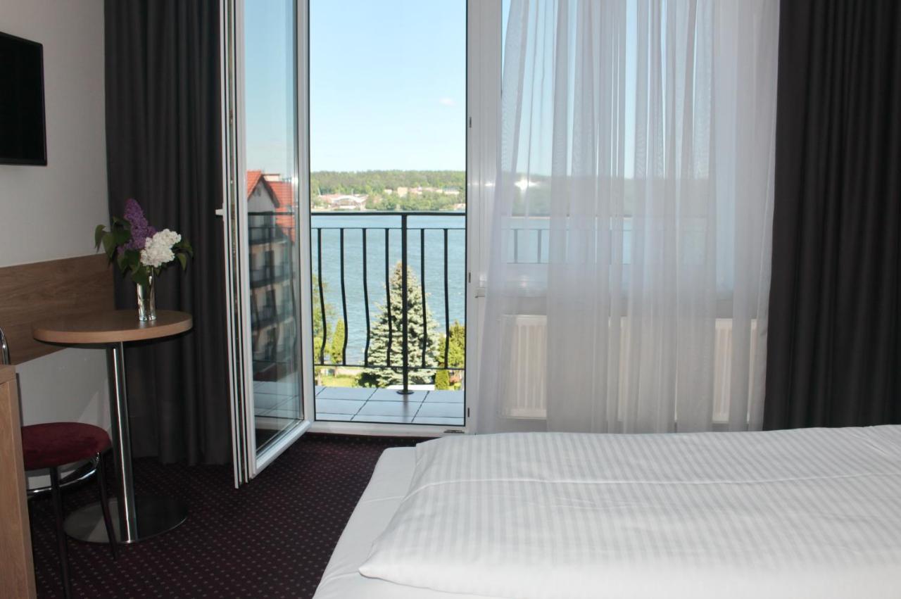 Hotel Huszcza Мронгово Экстерьер фото